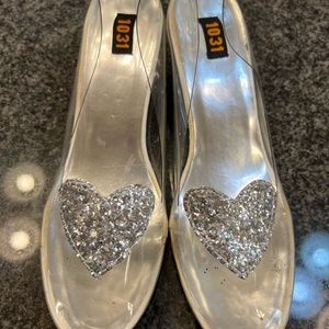 Clear Cinderella Shoes size 7 1/2 with 2 Inch heels. Decorated silver sequins
